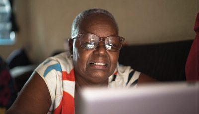 Photo Of A Female Using A Laptop