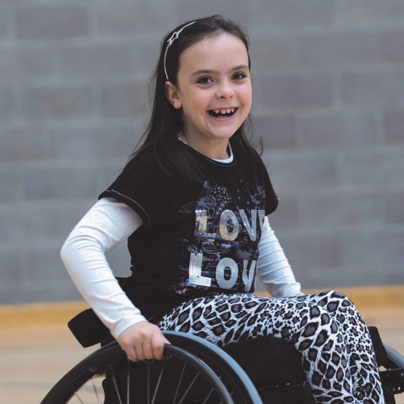 Girl In Wheelchair Smiling